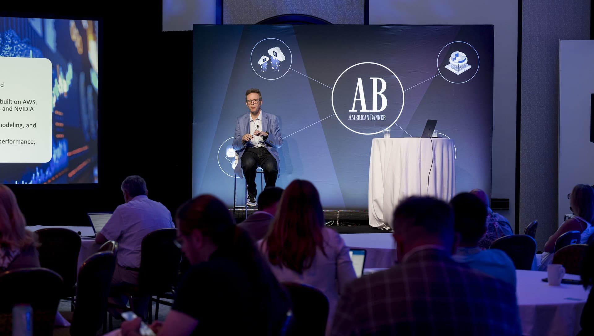 Aaron Cheiffetz on stage at American Banker